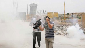 Israeli Forces Fire Tear Gas Canisters at Journalists in Front of Ofer Prison.